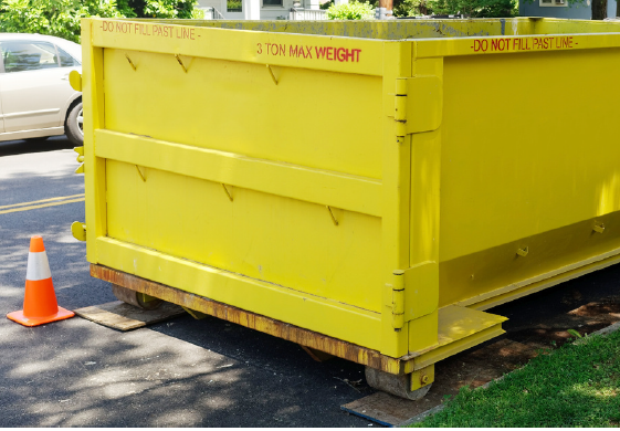 Dumpster in Road Way 